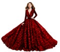 Fashion Model in Red Evening Dress. Beautiful Woman in Princess Ball Gown and Curly Hairstyle. Elegant Lady over White Royalty Free Stock Photo