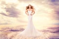 Fashion Model in Sea Waves, Beautiful Woman in Elegant White Dress Hairstyle Waving on Wind, Art Portrait Royalty Free Stock Photo