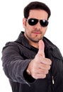 Fashion model showing thumbsup wearing sunglasses Royalty Free Stock Photo