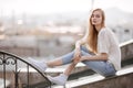 Fashion model. Summer look. Jeans, sneakers, sweater. Royalty Free Stock Photo