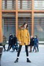 Fashion model walking and posing outdoor. Young blond caucasian woman posing winter outdoo. Beautiful girl, urban portrait in Royalty Free Stock Photo