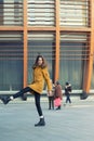 Fashion model walking and posing outdoor. Young blond caucasian woman posing winter outdoo. Beautiful girl, urban portrait in Royalty Free Stock Photo