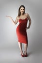 Fashion Model Wearing a Rose Red or Wine Colored Dress
