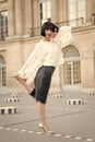 Fashion model in white blouse and leather skirt. Fashion woman in paris, france Royalty Free Stock Photo