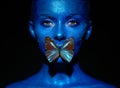 Fashion model woman with blue butterfly Royalty Free Stock Photo