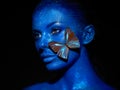 Fashion model woman with blue butterfly Royalty Free Stock Photo