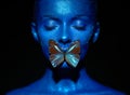 Fashion model woman with blue butterfly Royalty Free Stock Photo