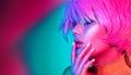 Fashion model woman in colorful bright lights Royalty Free Stock Photo