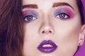 Fashion model woman creative pink and blue make up.  Beauty art portrait of beautiful girl with colorful abstract makeup. Royalty Free Stock Photo