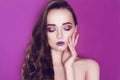 Fashion model woman creative pink and blue make up.  Beauty art portrait of beautiful girl with colorful abstract makeup. Royalty Free Stock Photo