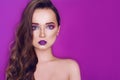 Fashion model woman creative pink and blue make up.  Beauty art portrait of beautiful girl with colorful abstract makeup. Royalty Free Stock Photo