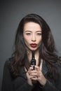 Fashion model woman with dark red lips in studio Royalty Free Stock Photo