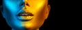 Fashion model woman face in bright sparkles, colorful neon lights, beautiful sexy girl lips. Trendy glowing gold skin makeup