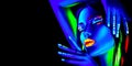 Fashion model woman in neon light, portrait of beautiful model girl with fluorescent makeup, Body art design in UV Royalty Free Stock Photo