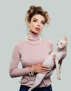 Fashion Model Womanl with domestic Hairless Cat Royalty Free Stock Photo