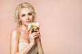 Fashion Models Beauty Portrait with Flowers, Beautiful Woman Nude Makeup and Hairstyle, Girl Studio Shot on Beige Royalty Free Stock Photo