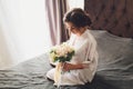 Fashion Models Portrait with Flower Bouquet, Beautiful Woman Bride Makeup and Hairstyle, Girl studio shot on gray Royalty Free Stock Photo