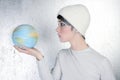 Fashion modern silver woman holding global map Royalty Free Stock Photo