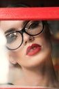 Gorgeous woman with dark hair in elegant glasses Royalty Free Stock Photo