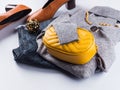 Fashion outfit with gray turtle neck, yellow bag Royalty Free Stock Photo