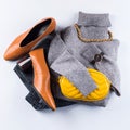 Fashion outfit with gray turtle neck, yellow bag Royalty Free Stock Photo