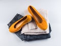 Fashion outfit jeans, yellow shoes, gray sweater Royalty Free Stock Photo