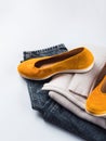 Fashion outfit jeans, yellow shoes, gray sweater Royalty Free Stock Photo