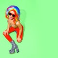 Fashion Party Lady in .multicolored wig and zebra boots. Club Disco style 90s. Minimal concept