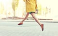 Young woman or teenage girl legs on city street Royalty Free Stock Photo