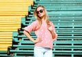 Fashion and people concept - pretty blonde in sunglasses posing Royalty Free Stock Photo