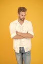 Fashion and people concept. Sexy and handsome. Confident young handsome man in jeans shirt. guy wearing jeans and t Royalty Free Stock Photo