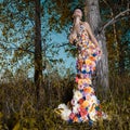 Fashion photo of beautiful lady in dress of flowers