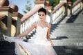 Fashion photo of beautiful woman with dark hair in luxurious wedding dress Royalty Free Stock Photo