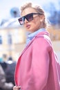 Fashion photo of beautiful young blond woman with stylish sunglasses. Royalty Free Stock Photo