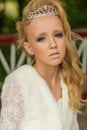 Fashion photo of a young girl in a beautiful white dress