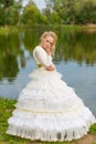 Fashion photo of a young girl in a beautiful white dress