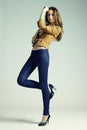 Fashion photo of young sensual woman in jeans Royalty Free Stock Photo