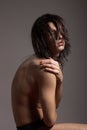 Fashion photography nude body young man model wet long hair Royalty Free Stock Photo