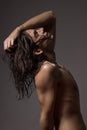 Fashion photography nude body young man model wet long hair Royalty Free Stock Photo