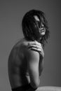 Fashion photography nude body young man model wet long hair Royalty Free Stock Photo