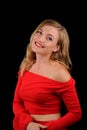 fashion picture of beautiful young blonde woman wearing red dress nice makeup Royalty Free Stock Photo