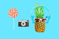 Fashion pineapple with sunglasses and headphones vintage camera