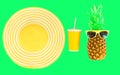 Fashion pineapple with sunglasses and yellow straw beach hat cup Royalty Free Stock Photo