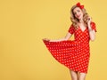 Fashion PinUp Girl in Red Polka Dots Dress.Vintage Royalty Free Stock Photo