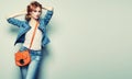 Fashion portrait of beautiful young woman with handbag Royalty Free Stock Photo