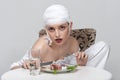 Fashion portrait of a girl who has a lunch of medicines Royalty Free Stock Photo