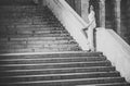 Fashion portrait. Gorgeous bride in white long dress posing on marble stairs before wedding ceremony, bride Royalty Free Stock Photo