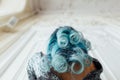 Fashion portrait of gorgeous girl with blue dyed hair long. The beautiful evening cocktail dress. Royalty Free Stock Photo