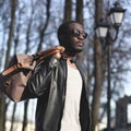 Fashion portrait of handsome african man in black leather jacket Royalty Free Stock Photo