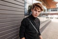 Fashion portrait of a handsome young man in a black pullover Royalty Free Stock Photo